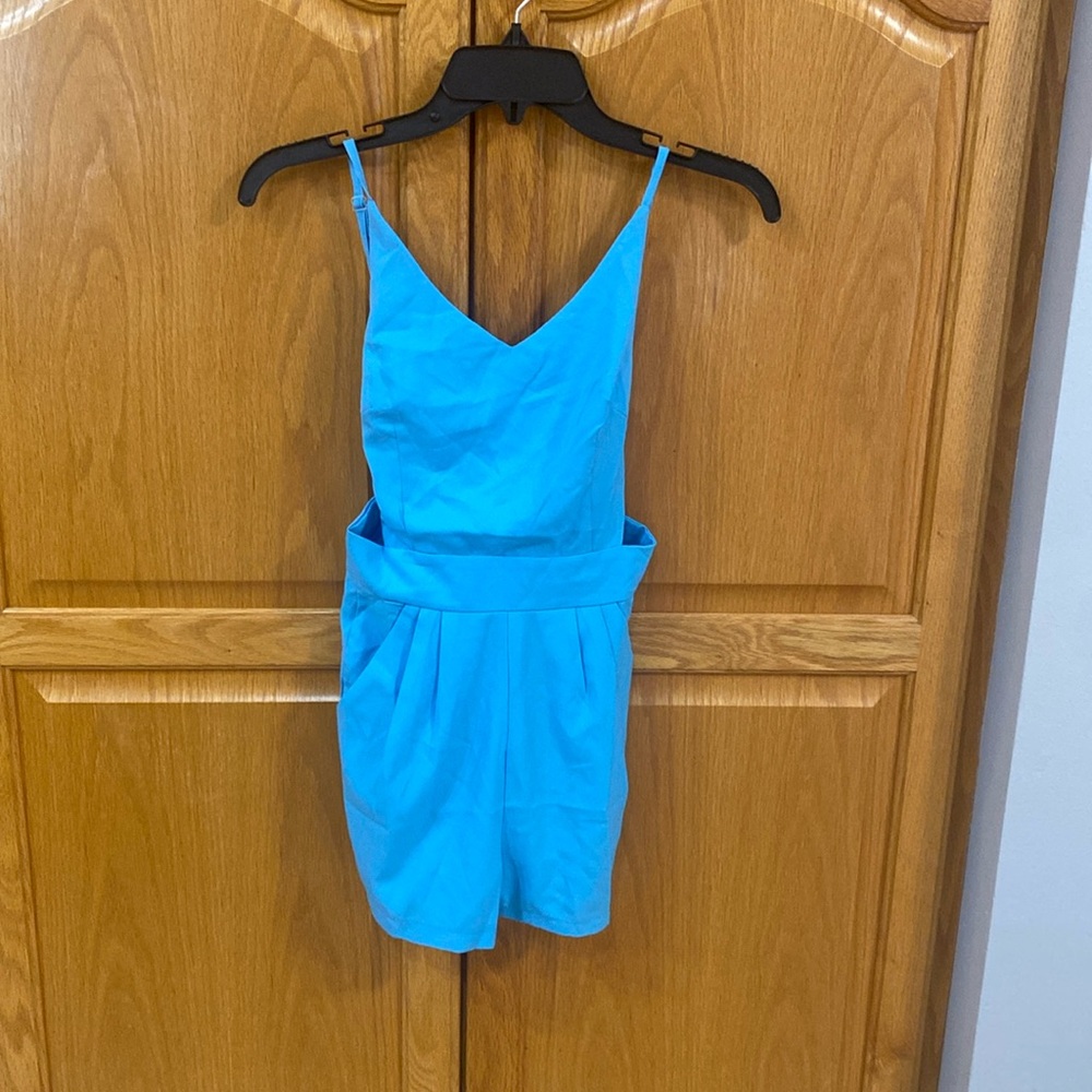 Nadasha brand Romper. Size small. Brand new with tags.